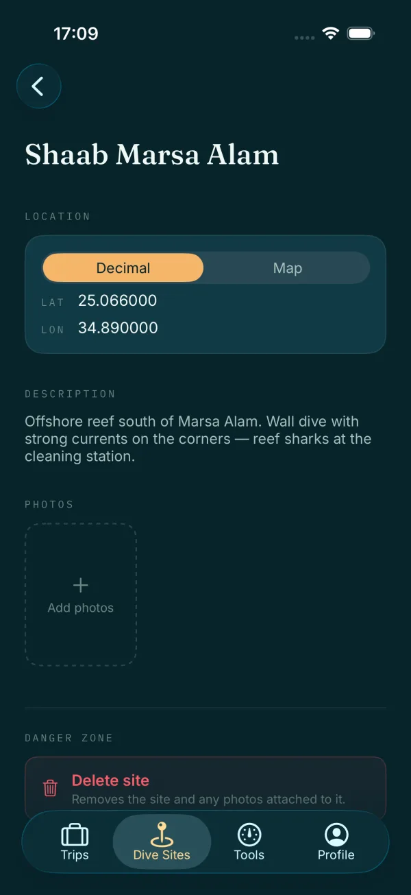 Dive site detail showing photos, coordinates, and a map pin.